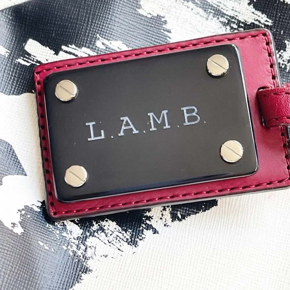 Rare L.A.M.B. Huntley hobo bag by Gwen Stefani, black, white graffiti red trim